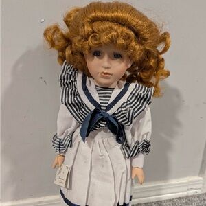 Porcelain Doll with Striped Dress